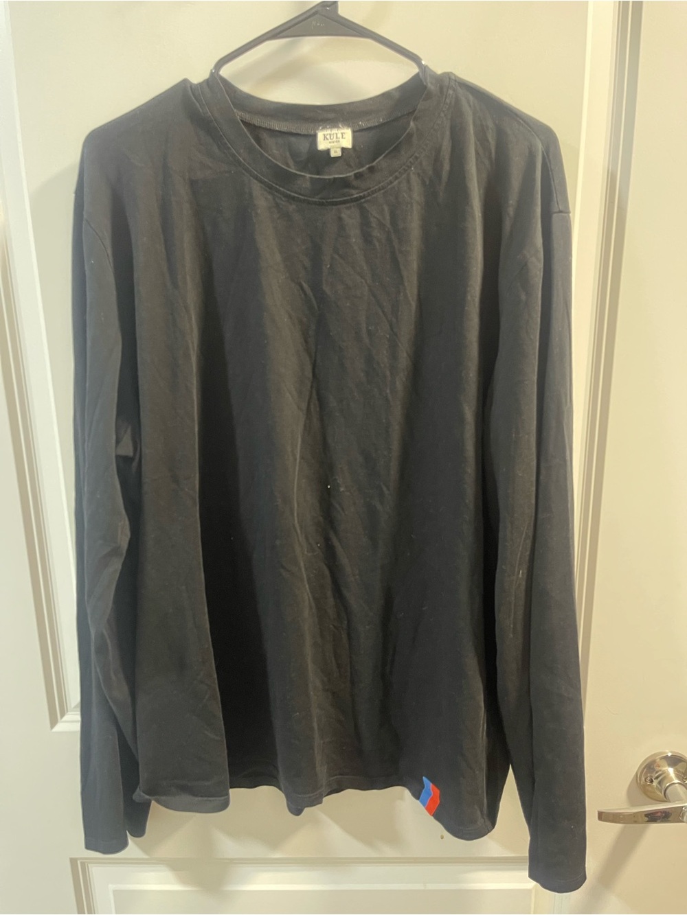 KULE Black Long-Sleeve Crew Tee with Small Logo Tab